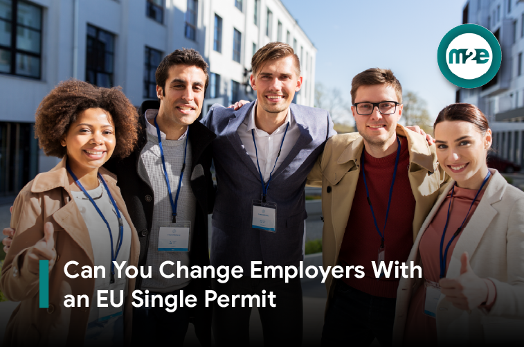 Changing employer while holding a work and residence permit in the EU Foreign worker reviewing an employment contract and residence card at a desk